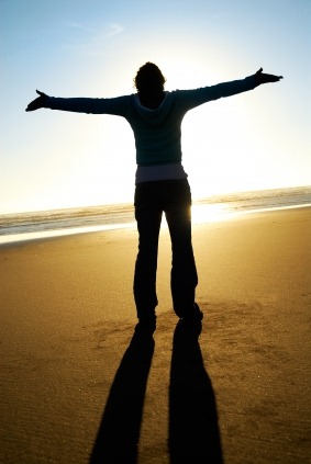 5aotpersonextendingarmsingratitudeonthebeach.jpg